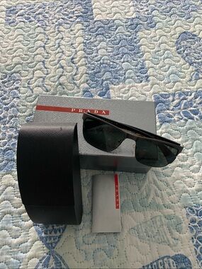 Prada Black Frame Sunglasses with Dark Green Lenses